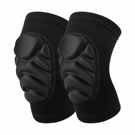 A pair of black protective knee pads with molded foam padding, shown against a plain white background with a 'Sporting goods.lb' watermark in the top right.